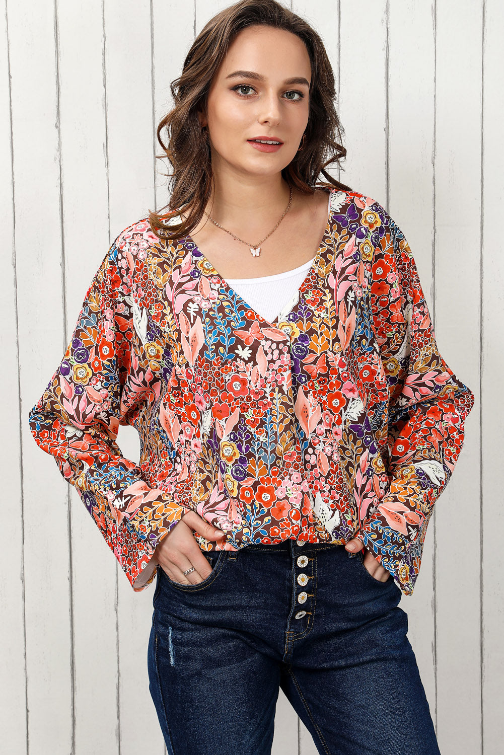 Blouse met lange mouwen en V-hals en bloemenmotief