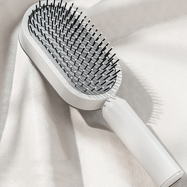 Zelfreinigende Haarborstel – Anti-klit Borstel met Eén-klik Reiniging & Massagefunctie